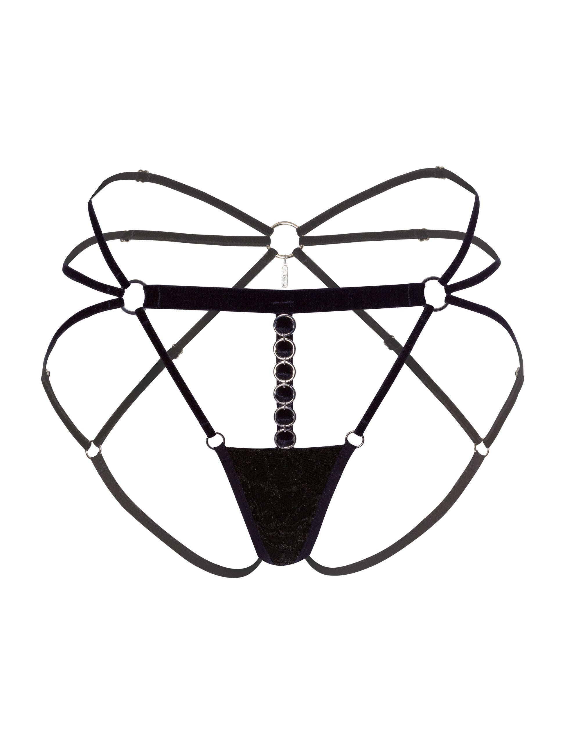 Adjustable black ouvert panties made with multiple outlining velvet straps, floral black lace, silver o-ring hardware and an engraved pendant in the back.