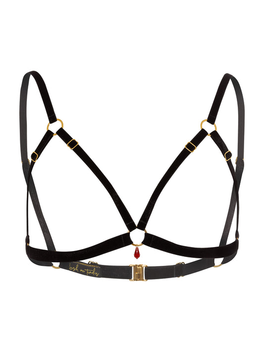 Adjustable black velvet open-cup bra with gold o-ring and red Swarovski crystal pendant.