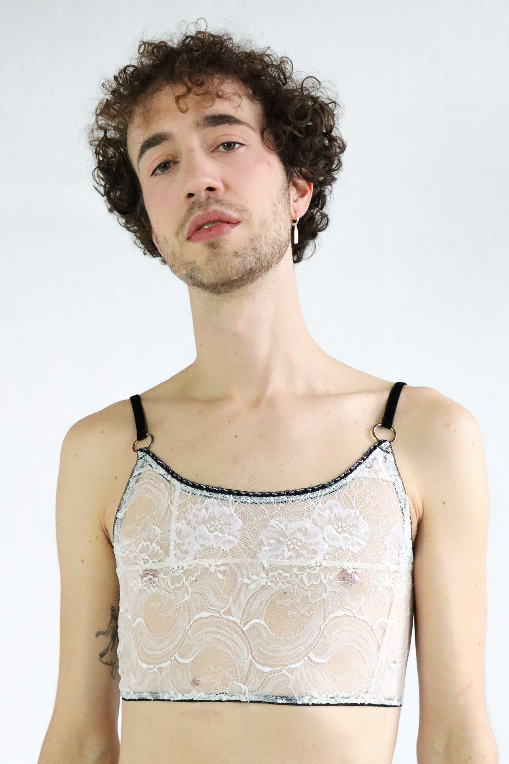 Floral-patterned white Lace Unisex Crop top with adjustable black velvet straps and silver hardware. Size Medium-Large.