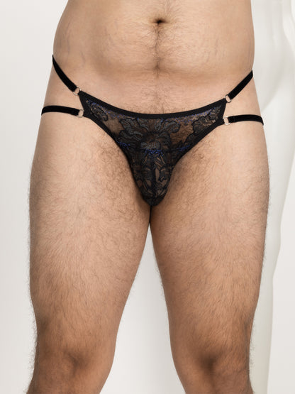 Gender-free black lace pouch fit panties with floral motif and dark blue details, 2 adjustable velvet straps on each hip and silver hardware.