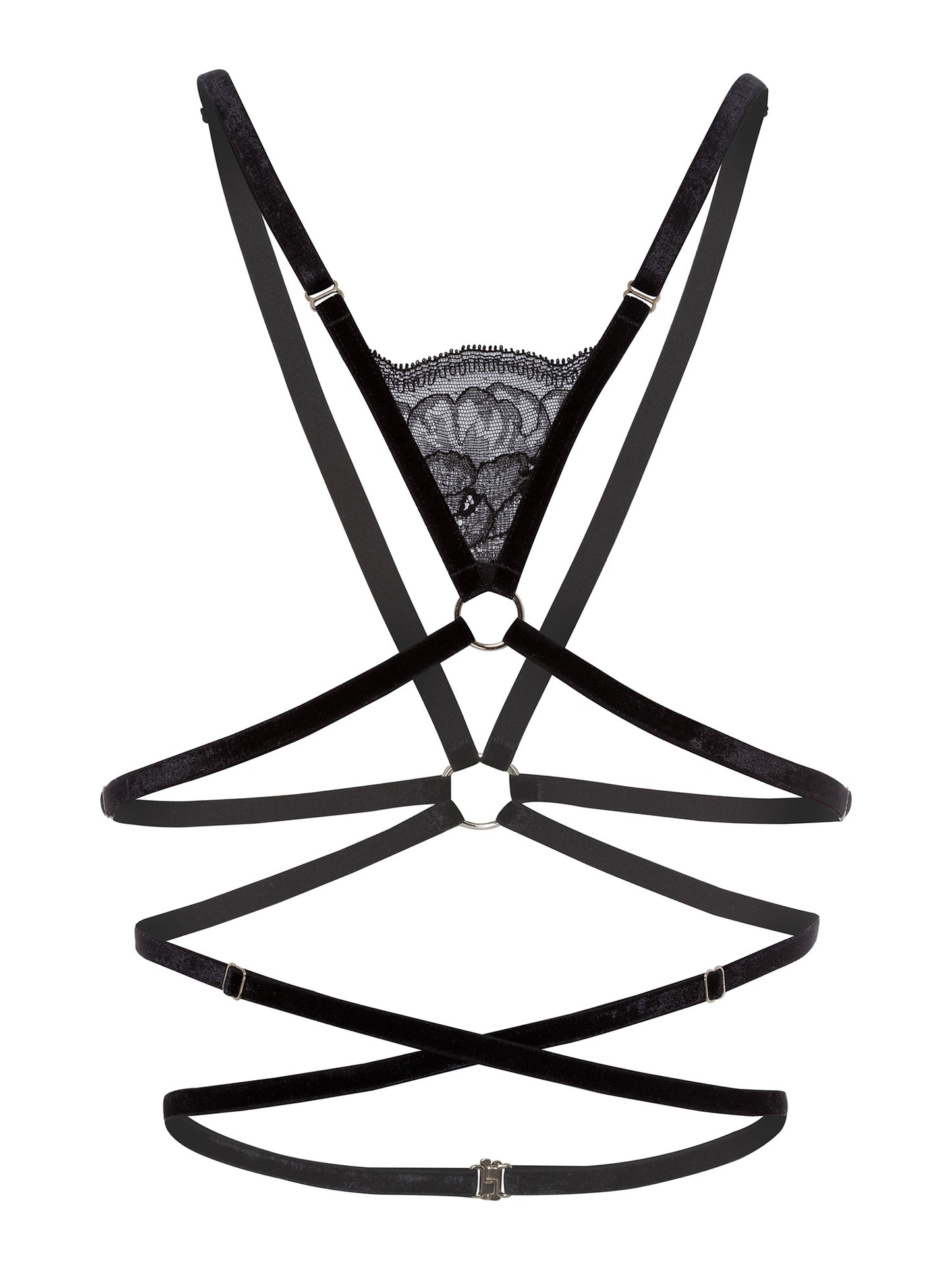 Adjustable black velvet chest harness made of multiple straps crossing on the chest and waist, a piece of black floral lace and silver hardware.