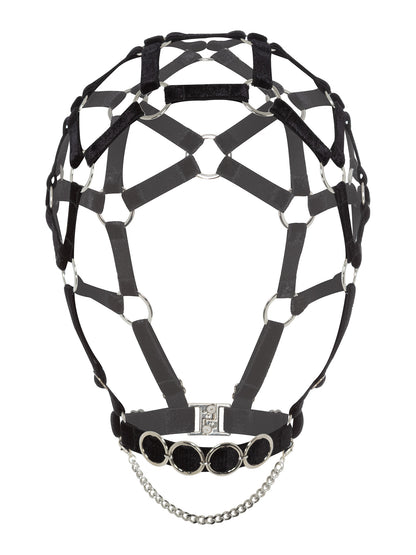 Front view of an adjustable black velvet head harness with caged design and silver chain details around the neck.