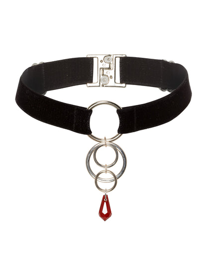 Adjustable black velvet choker with a silver 4 rings charm attached to a red crystal pendant.