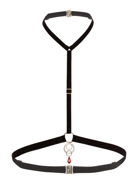 Minimalist chest harness made of black velvet straps and a 4 o-rings charm attached to a red crystal pendant.