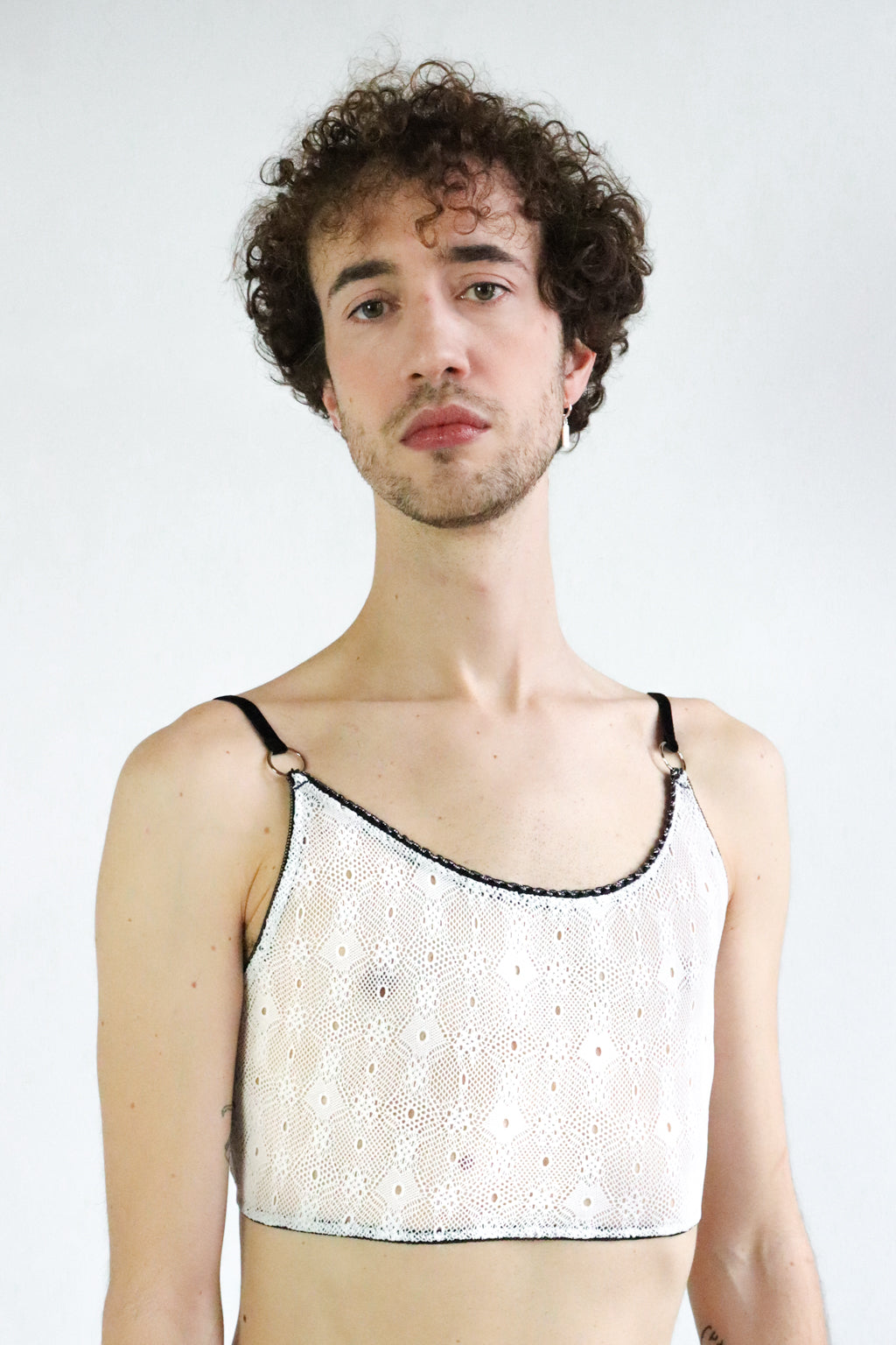 White Lace Unisex Crop top with adjustable black velvet straps and silver hardware. Size Medium-Large.