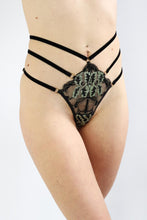 Load image into Gallery viewer, Woman wearing a floral lace high waisted thong, with 3 adjustable straps on each side.
